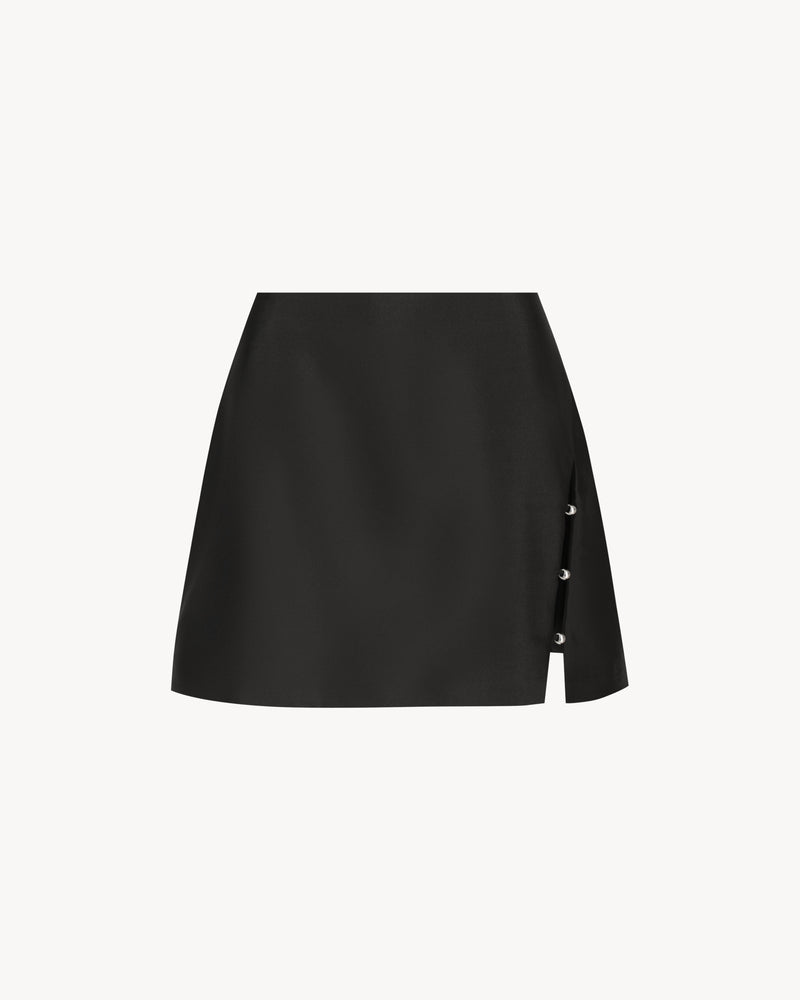 Anya Mini Skirt in Midnight Black, a wool silk mini skirt with faux-wrap front, side slit and bead detail.