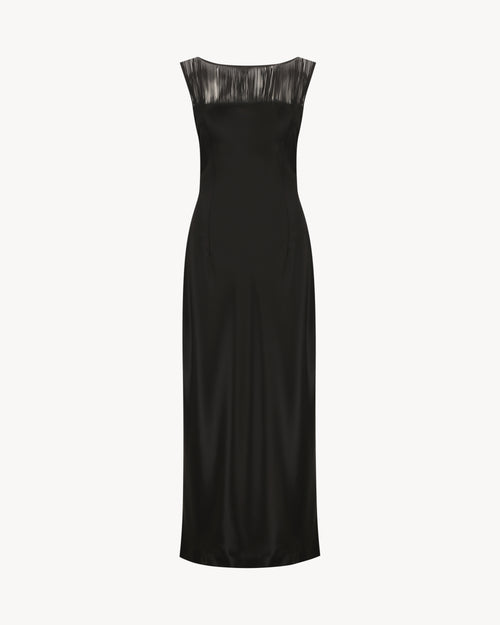 Carolyn Maxi Dress in Midnight Black, a satin maxi dress with a boat neckline and fringe detail.