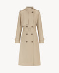 Celeste Trench Coat in White Pepper, a beige cotton funnel neck trench coat with structured silhouette.