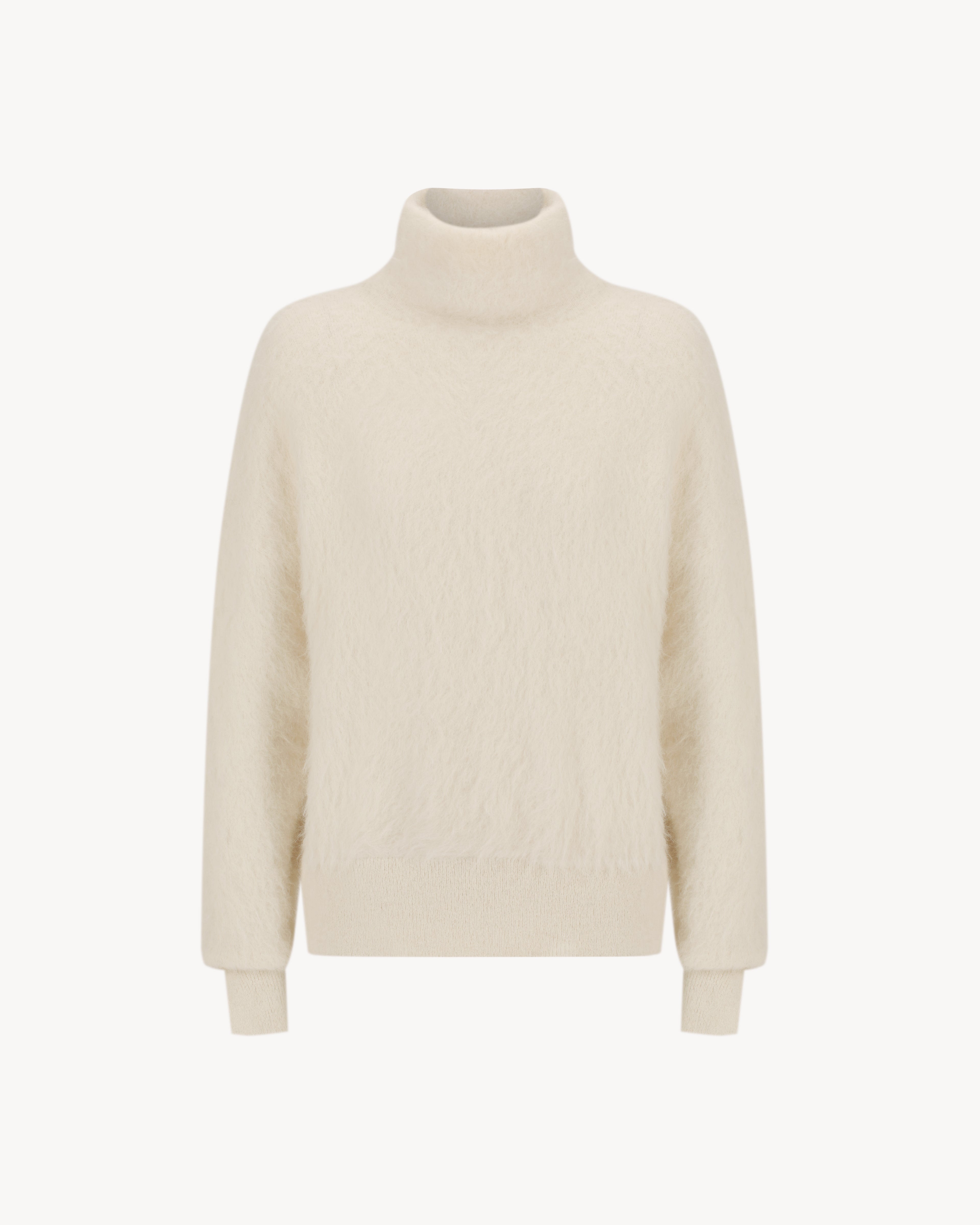 Lauren Turtleneck in Feather White, an alpaca turtleneck knit with long sleeves, brushed texture and soft stretch.