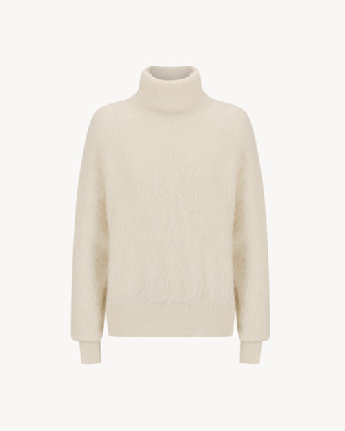 Lauren Turtleneck in Feather White, an alpaca turtleneck knit with long sleeves, brushed texture and soft stretch.