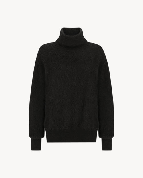 Lauren Turtleneck in Midnight Black, an alpaca turtleneck knit with long sleeves, brushed texture and soft stretch.