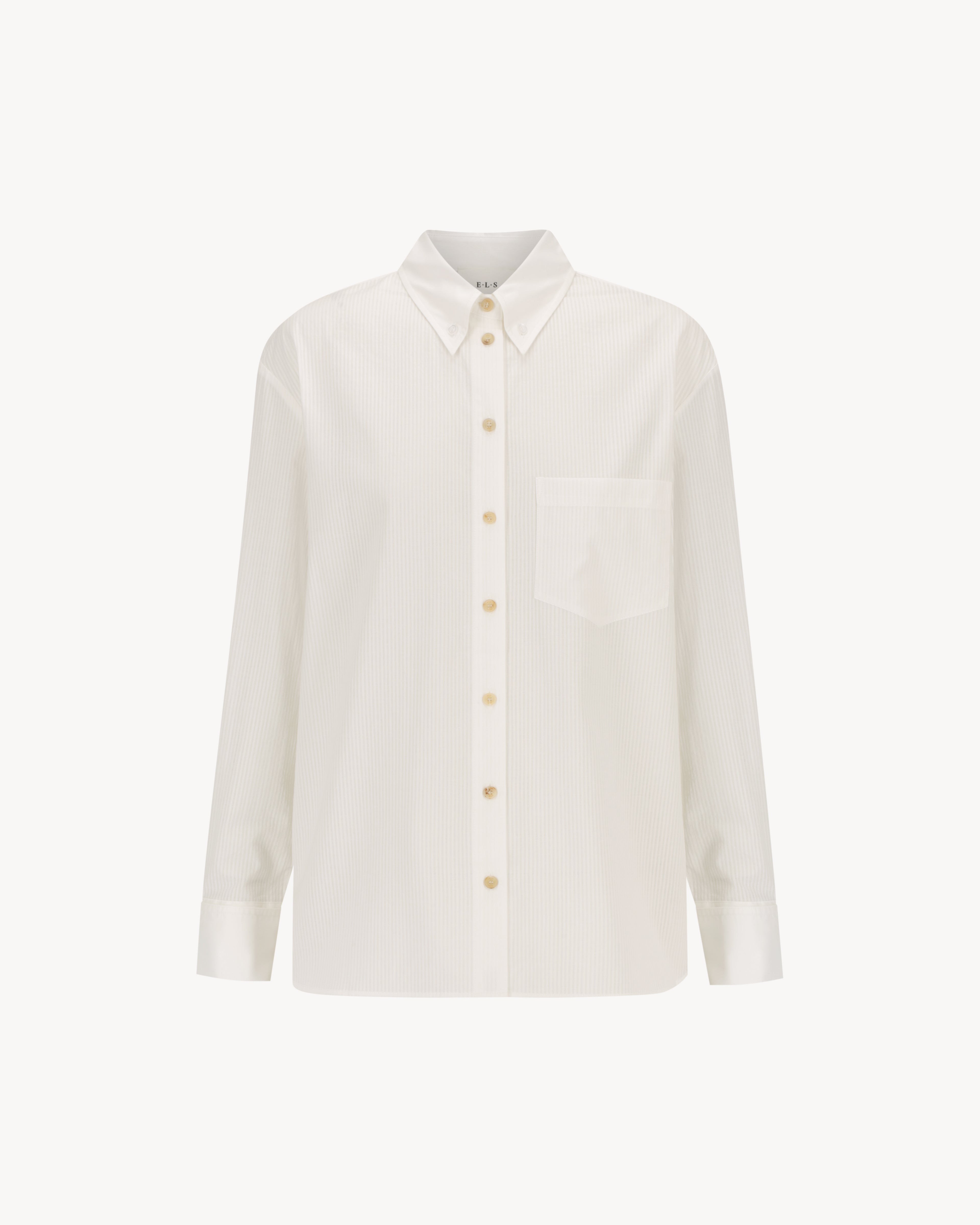 Margot Shirt in Cloud White, a white cotton button-down shirt with tonal pinstripe and natural horn buttons.