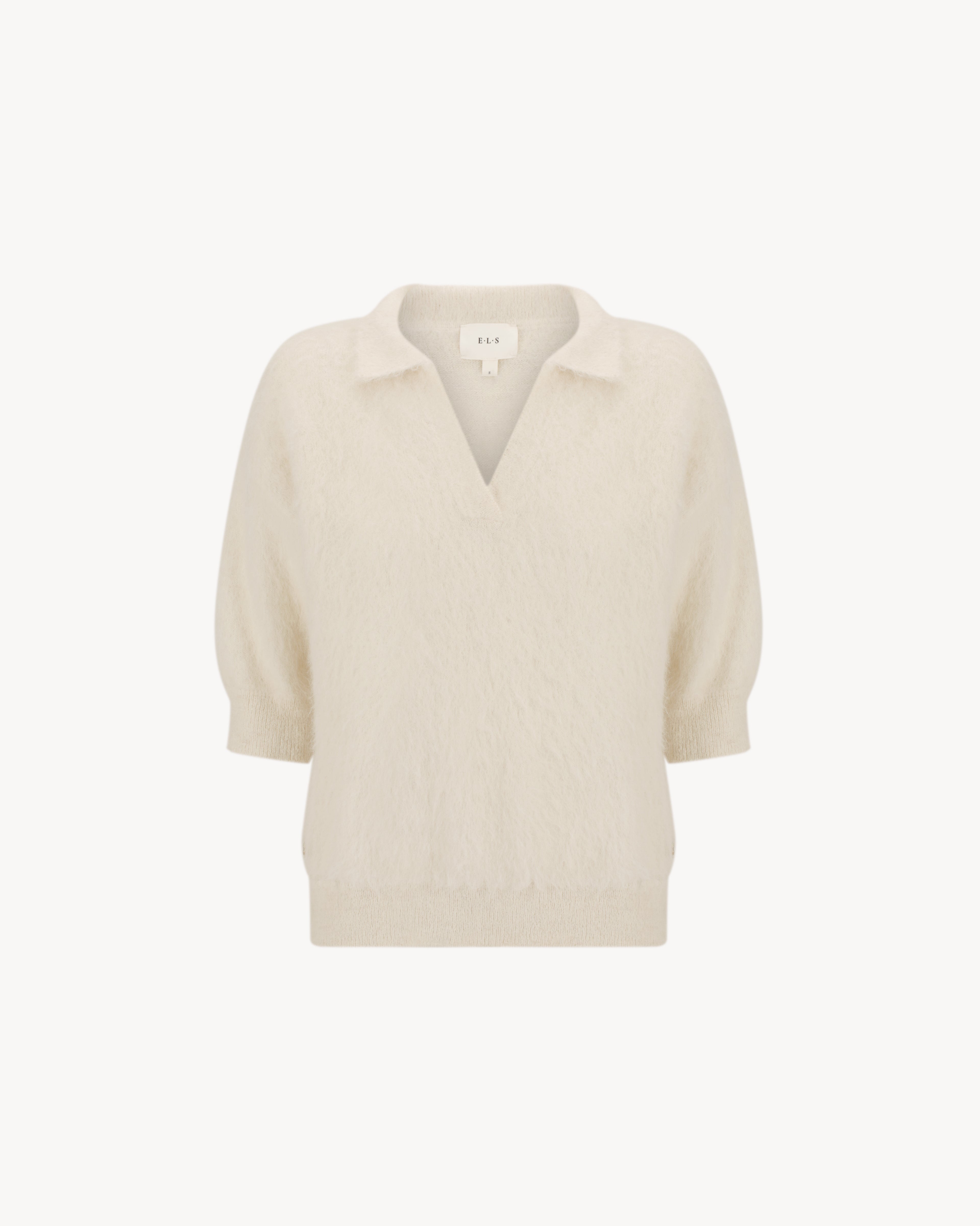 Stella Polo Knit in Feather White, an alpaca polo knit with short sleeves, brushed texture and soft stretch.