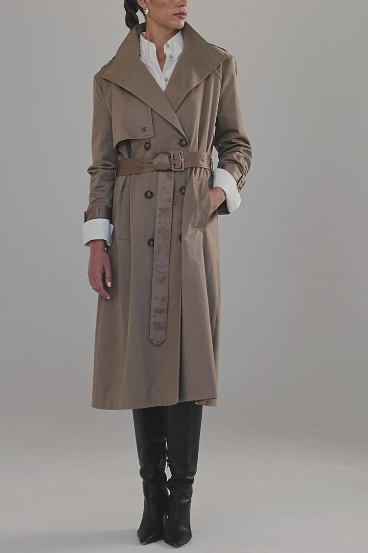 Video showing the Celeste Trench Coat in Desert Taupe worn open with reversible belt detailing and styled with the Margot Shirt.
