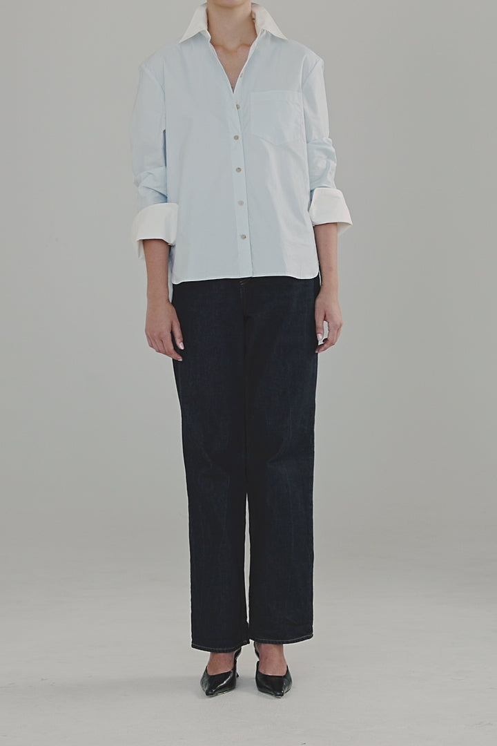 Video showing the Margot Shirt – All Tied Up in Blue/White Pinstripe styled with a relaxed silhouette, cuffed sleeves and contrast collar detailing.